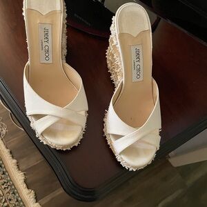 Jimmy Choo shoe  in White - heel height 4.5 “.  Hardly worm.   No box.